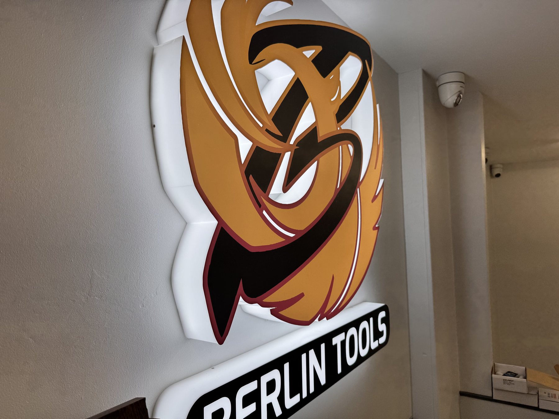 Illuminated Merlin Tools interior wall sign